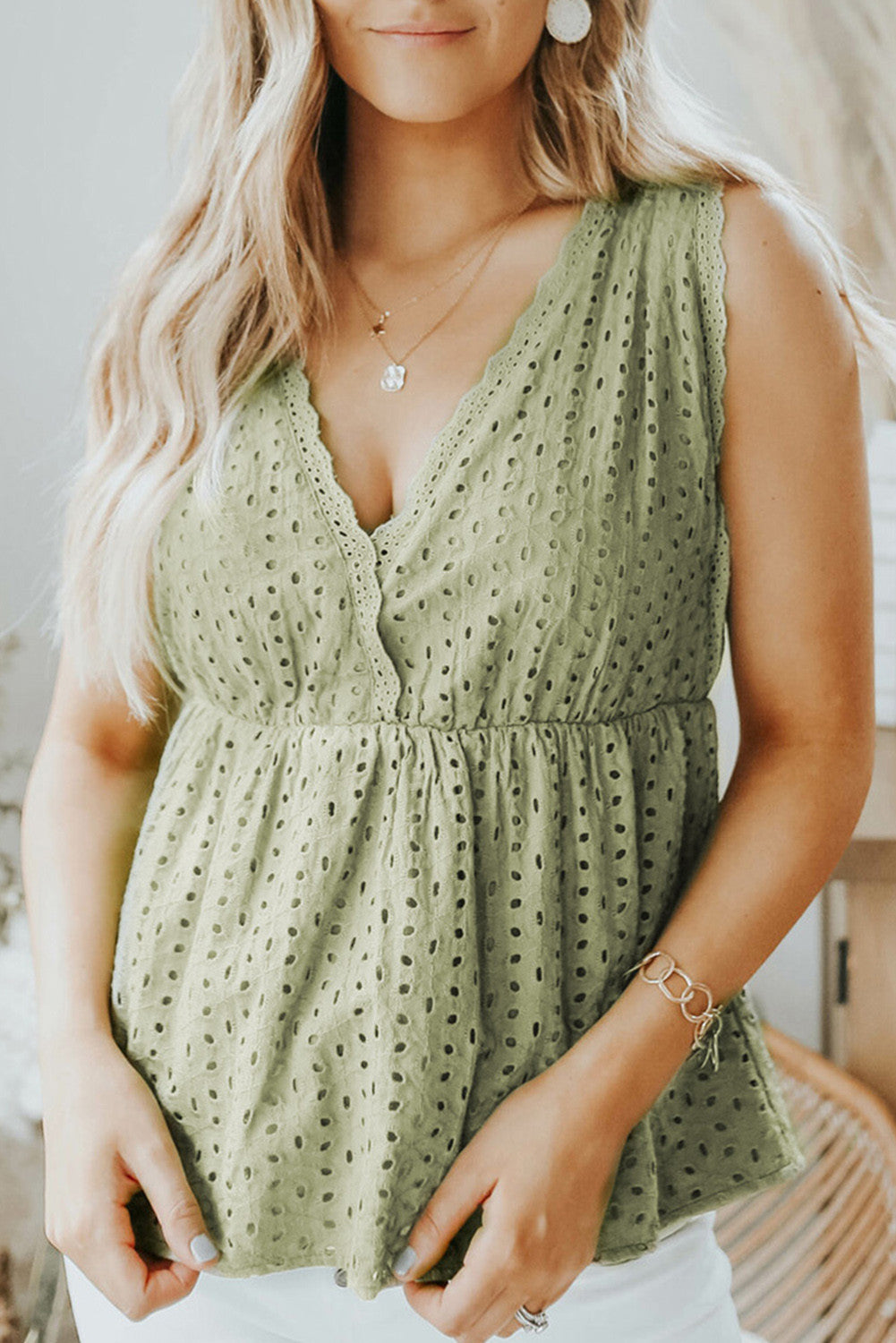 Green Sleeveless Eyelet Peplum Top